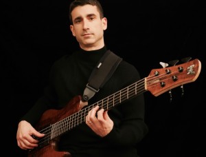Damian Coccio performing solo bass guitar